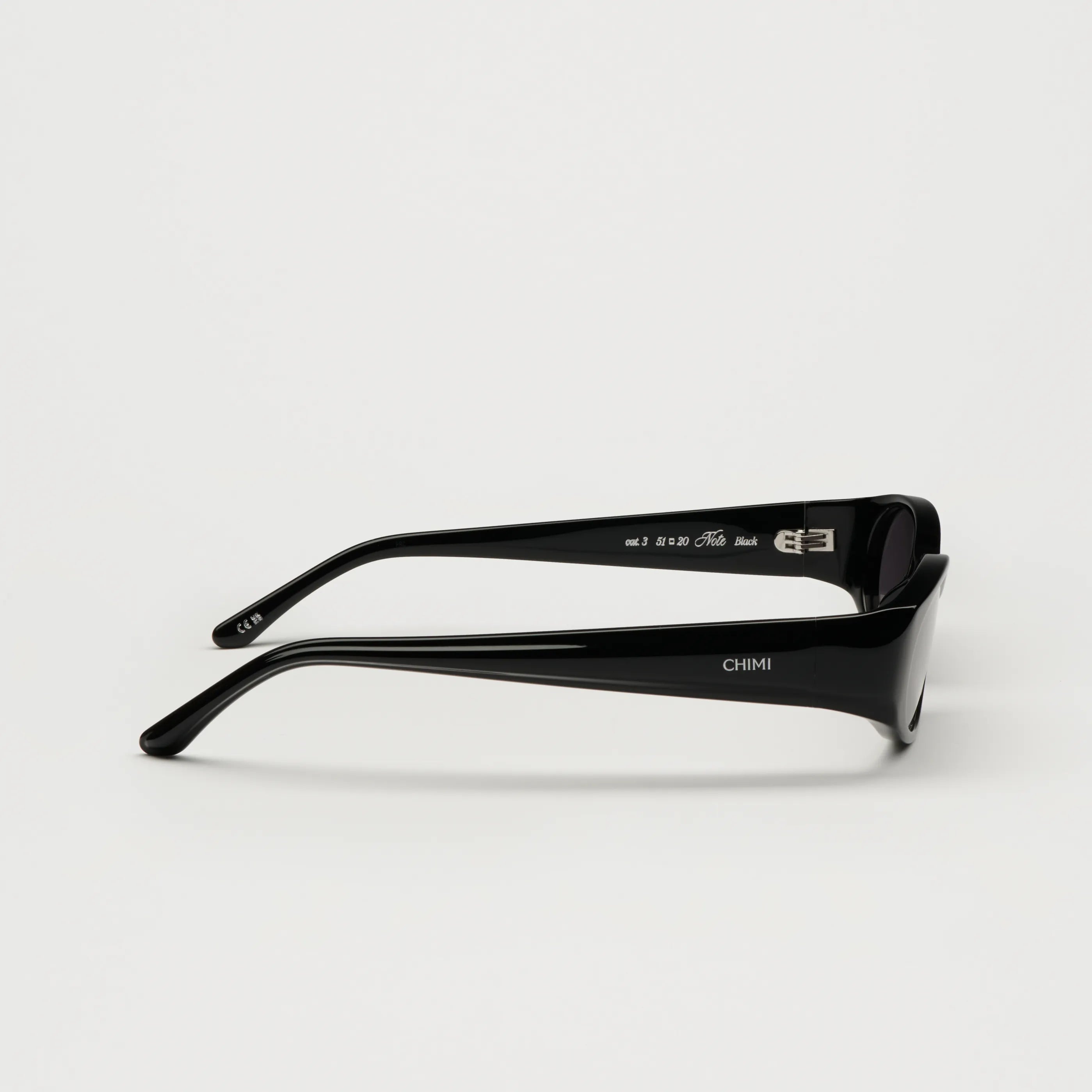 Note Black Sunglasses side view showing sleek black design and durable Acetate material with high-quality finish.
