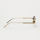 Side view of stylish Oval Gold Sunglasses featuring a sleek bio nylon frame and scratch-resistant lenses.
