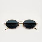 Oval Gold Sunglasses featuring UV 400 protection and eco-friendly bio nylon frame with polycarbonate lenses.