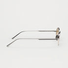 Profile view of Oval Silver Sunglasses showcasing the sleek design and eco-friendly materials.
