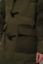 Barack Dark Olive Green Parka featuring durable pockets and stylish design, ideal for inclement weather.