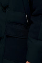 Barack Sky Captain Blue Parka showing close-up of the sleeve detail and pocket design.