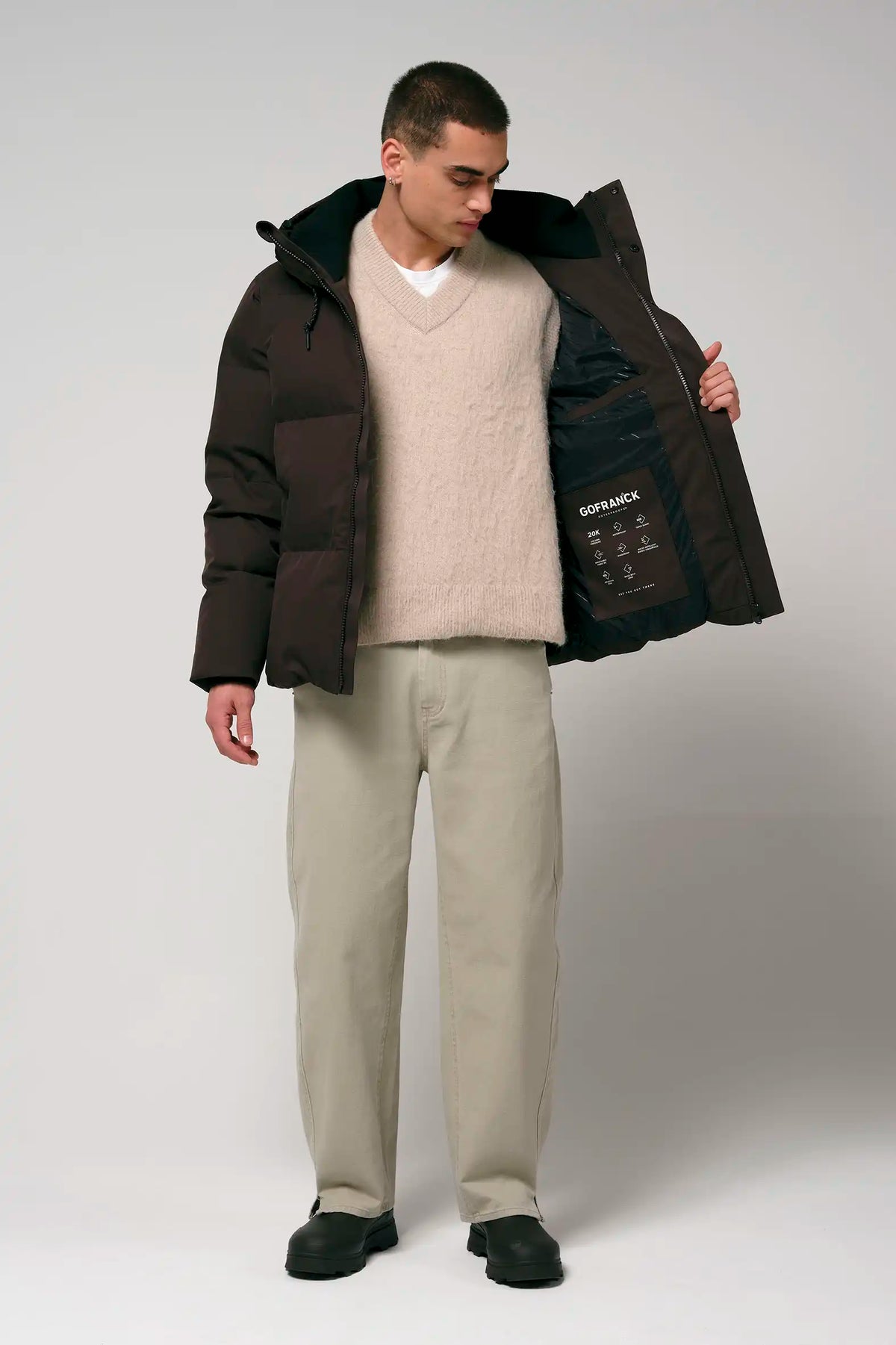 Model wearing Bayu Black Coffee Coat showcasing its stylish design and comfortable fit.