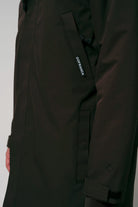 Cielo Black Coffee Coat close-up showing design details and pocket features in waterproof material.