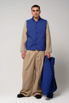 Model wearing Claud Sodalite Blue Coat, showcasing its stylish design and functionality.