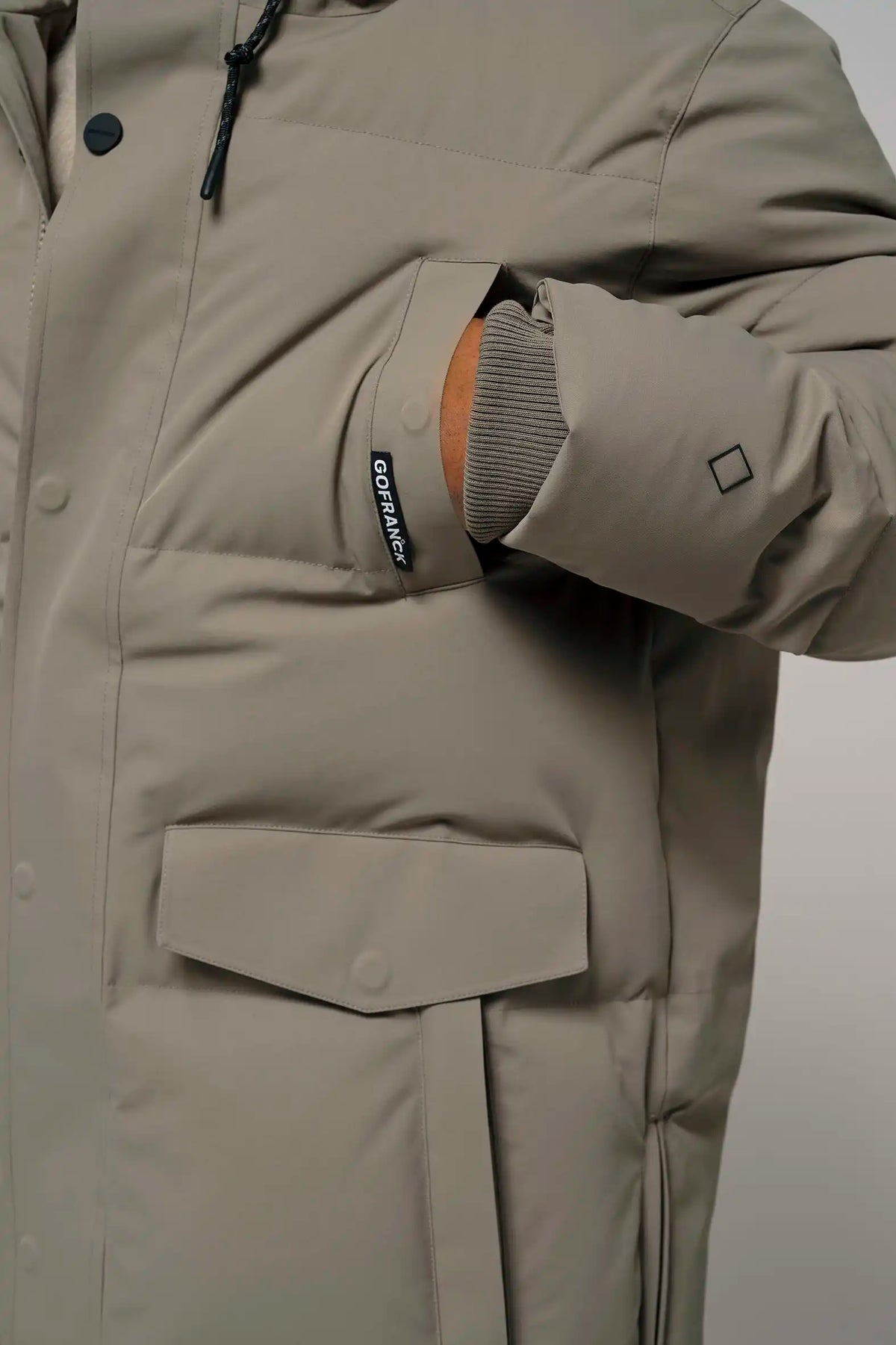 Close-up of the Climate Timber Wolf Grey Coat showcasing the pocket design and cuff details.