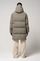 Climate Timber Wolf Grey Coat back view on model wearing beige pants.