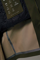 Interior view of the Raiden Dark Olive Green Parka showcasing waterproof and breathable features.