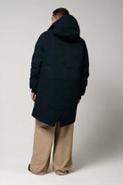 Stratus Sky Captain Blue Parka displayed from the back, showcasing its sleek design and adjustable hood.