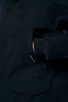 Close-up of Stratus Sky Captain Blue Parka pocket and sleeve detail showcasing waterproof material and design features.