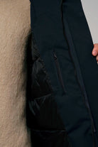 Detail of the Stratus Sky Captain Blue Parka showcasing inside pocket and lining.