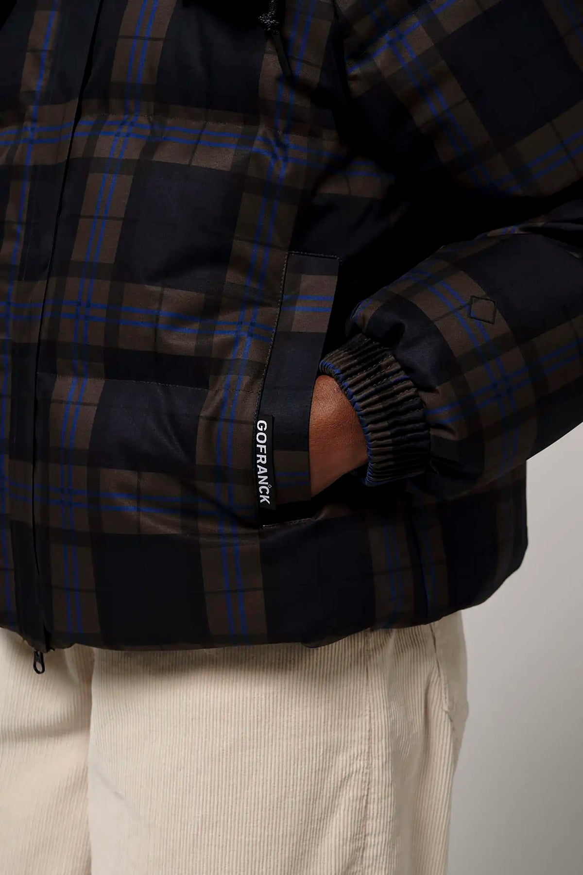 Talon Blue Tartan Check Coat showcasing waterproof design and stylish plaid fabric.