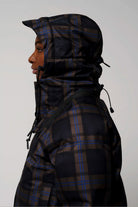 Talon Blue Tartan Check Coat side view showcasing adjustable hood and waterproof material.
