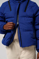 Talon Sodalite Blue Coat featuring a zipper and adjustable elements for style and comfort.