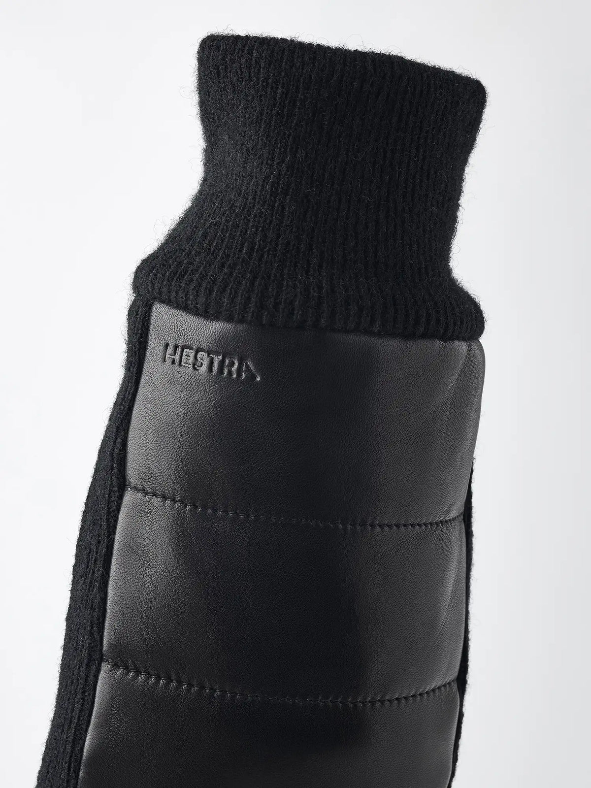 Jeanne Mitt Black Gloves by Hestra featuring a soft wool cuff and supple hairsheep nappa leather for cold weather.