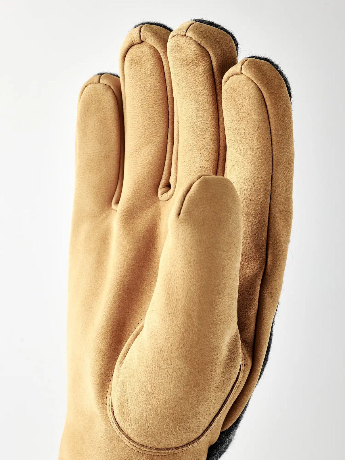 Noah Charcoal Tan Gloves by Hestra, featuring nubuck goat leather palm and wool blend backhand for warmth.