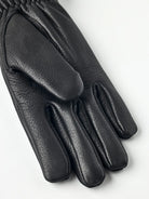 Tiril Black Gloves by Hestra, supple deerskin leather gloves with soft wool lining for warmth.