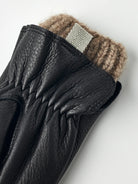 Tiril Black Gloves by Hestra featuring supple deerskin leather and soft wool lining for warmth and comfort.