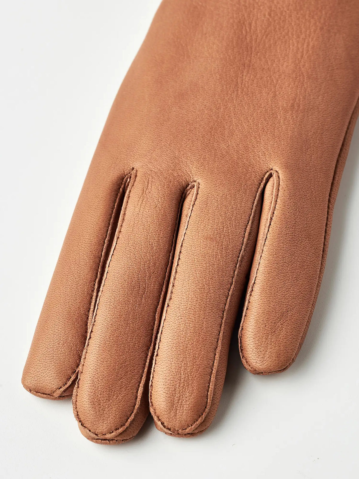 Tiril Cork Gloves by Hestra, women's deerskin gloves showcasing supple leather texture and elegant design.