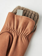 Tiril Cork Gloves by Hestra, featuring supple deerskin leather and soft wool lining, perfect for cold weather.