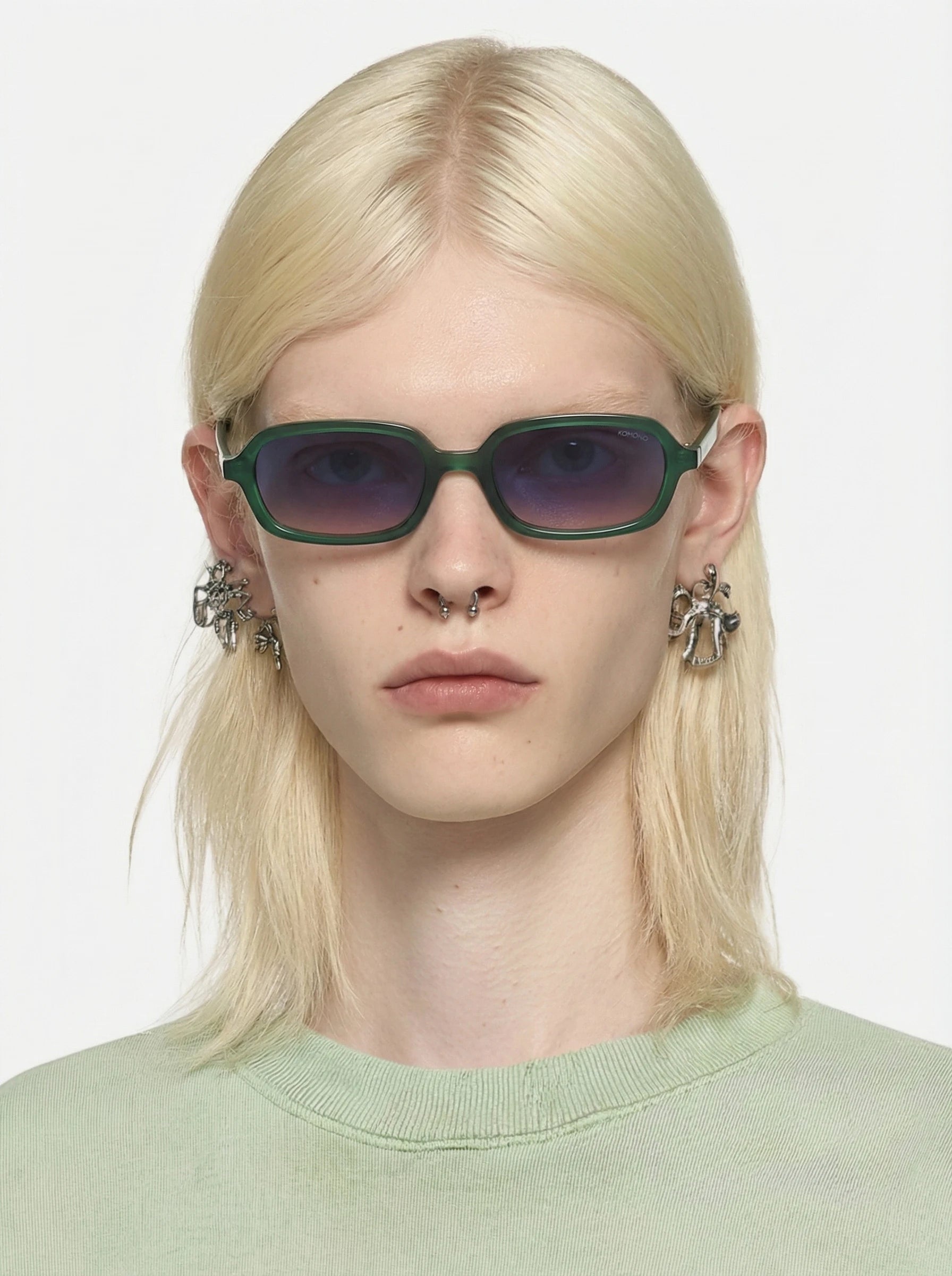 Person wearing Hayden Green Jungle Sunglasses with UV 400 protection and bio nylon frame.
