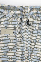 Forti Swim Shorts featuring lightweight design, elastic waist, and a hidden zip pocket for essentials.
