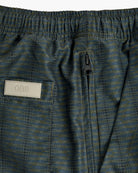 Getrick Swim Shorts back view showing elastic waist and zip pocket detail on lightweight fabric.