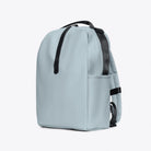 Clip Front Backpack Pool Backpack in light blue color with side pocket and padded straps.