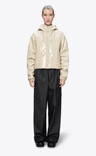 Lohja Short Insulated Jacket Shore Coat worn by model, showcasing a padded design and stylish look.