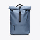 Rolltop Rucksack Blue Dusk Backpack showcased in a fully waterproof design with roll-top closure and front zipper.