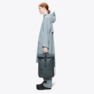 Rolltop Rucksack Dark Grey Backpack shown on a model in an outdoor outfit, demonstrating its stylish and functional design.