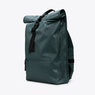 Rolltop Rucksack Mystique Backpack in waterproof green material with roll-top closure and front zipper.