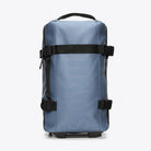 Texel Cabin Bag Small Blue Dusk Suitcase shown with water-resistant design and adjustable straps.