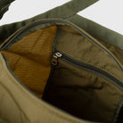 Interior view of Grid Crossbody Bag Olive Shoulder Bag showing zip pocket and expandable features.