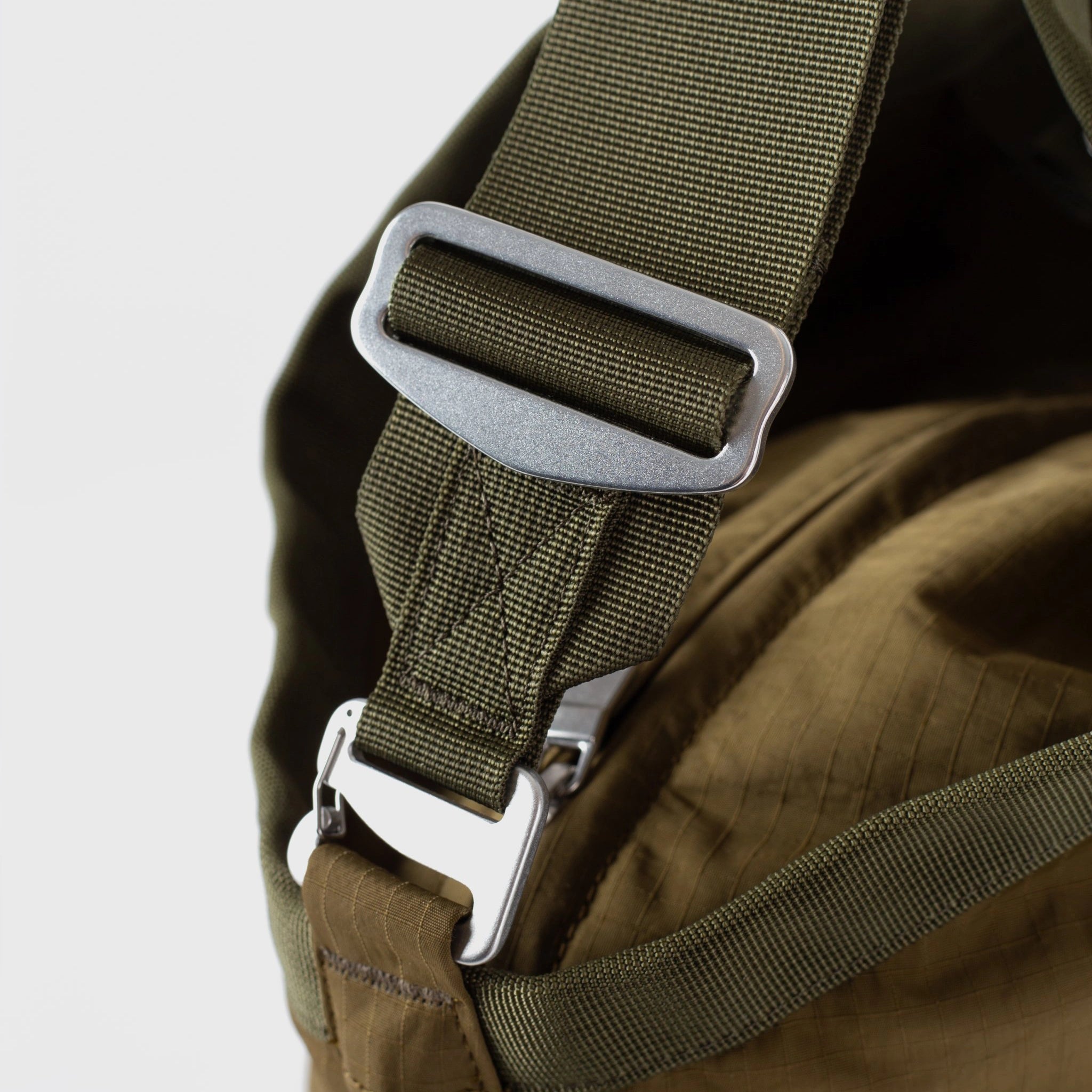 Grid Tote Bag Olive Shoulder Bag adjustable strap detail with metallic buckle