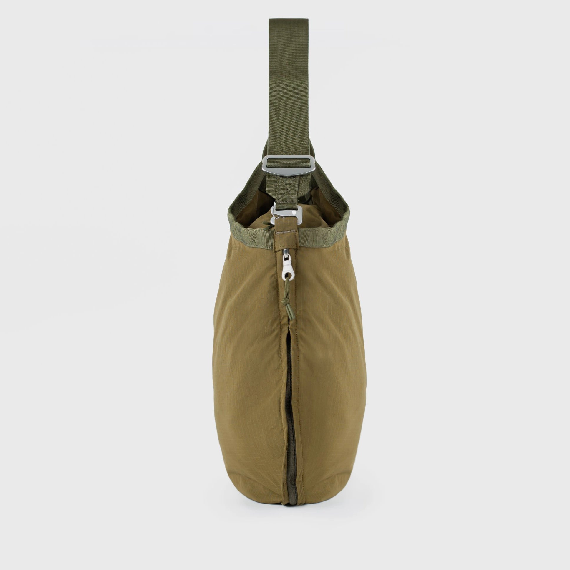 Grid Tote Bag Olive Shoulder Bag showing water-resistant fabric and adjustable strap design.