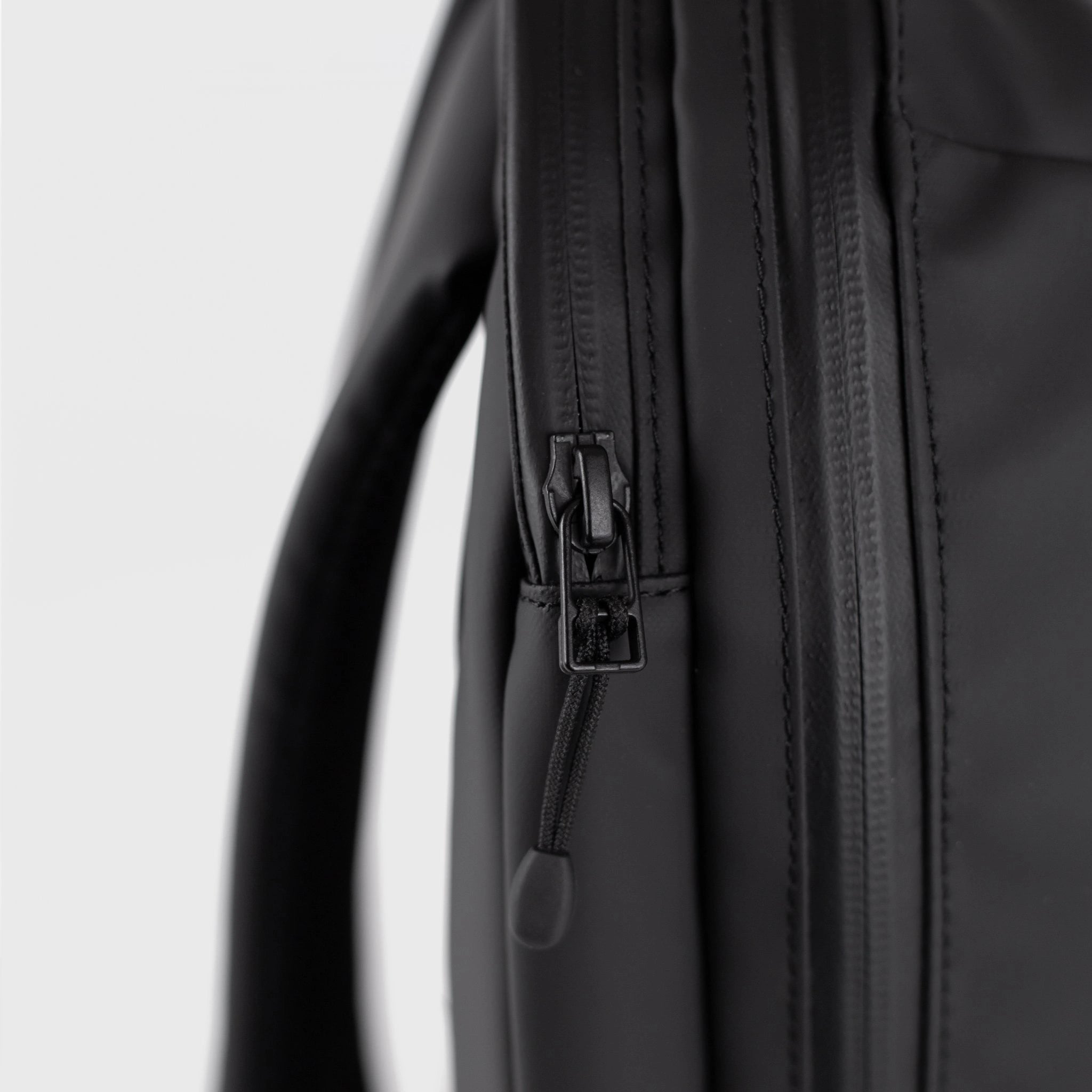 Stream Zipper Backpack Black Backpack close-up of waterproof YKK Aquaguard zipper detail