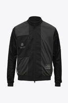 Plain II Onyx Jacket featuring a modern design, lightweight fabric, windproof and waterproof for versatile summer styling.