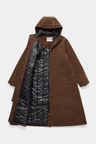 Mosebacke Long Matte Dark Brown Winter Coat displayed with an adjustable hood and fleece lining.