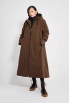 Mosebacke Long Matte Dark Brown Winter Coat worn by model against a plain background.