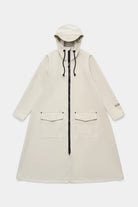 Mosebacke Long Patch Pelican Raincoat in beige with A-line silhouette and adjustable hood.