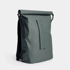 Rain Rolltop 25L Green Backpack featuring waterproof design and rolltop opening, styled in Stockholm.