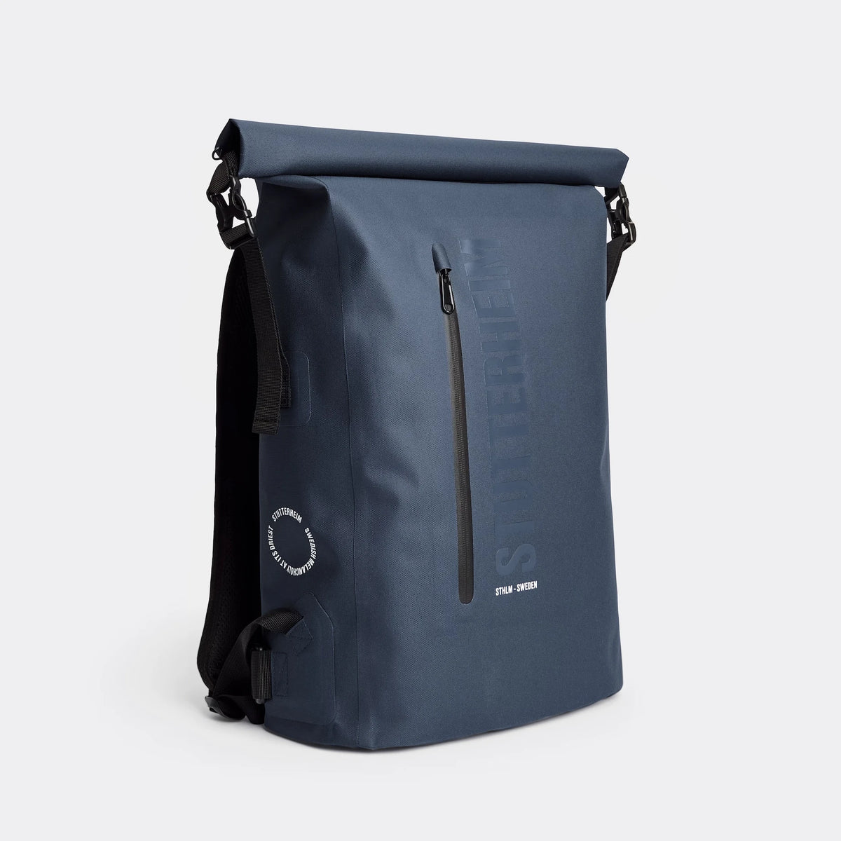 Rain Rolltop 25L Navy Backpack with waterproof design and rolltop opening for outdoor use.
