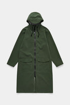 Stockholm Long Patch Matte Green Raincoat with adjustable hood and patch pockets.