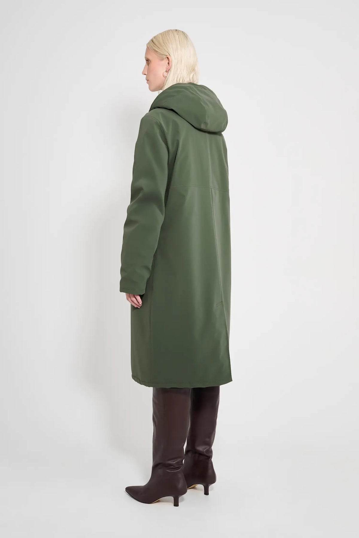 Back view of the Stockholm Long Matte Green Winter Coat featuring a hood and oversized fit.