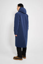 Stockholm Long Matte Navy Winter Coat displayed from the back, showcasing the adjustable hood and waterproof design.