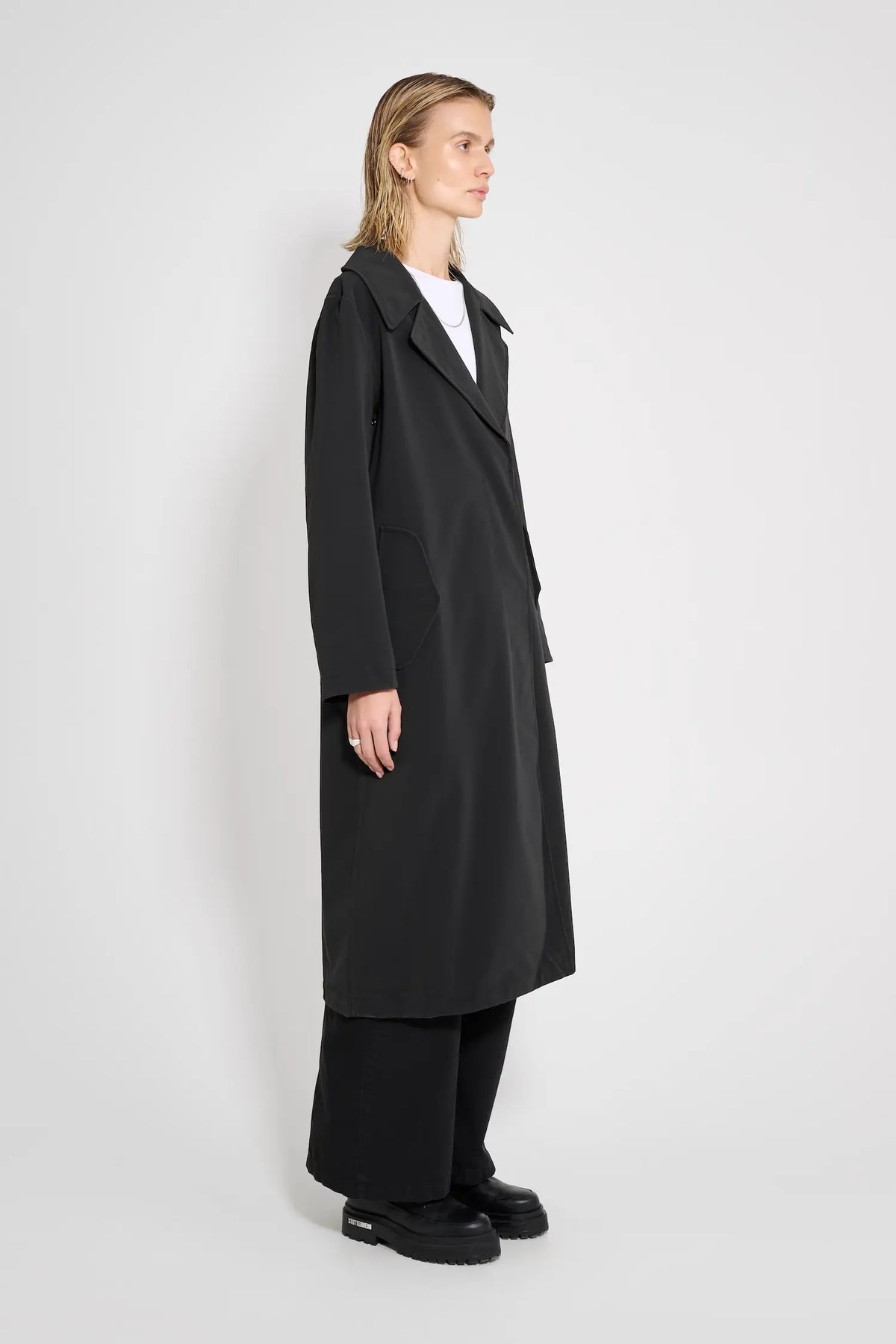 Wayfair Black Trench Coat displayed in a side view, showcasing waterproof fabric and oversized fit.