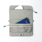 Interior view of Phone Sacoche 90 Purple Washed Silk Nylon Bag showing compartments for documents and accessories.