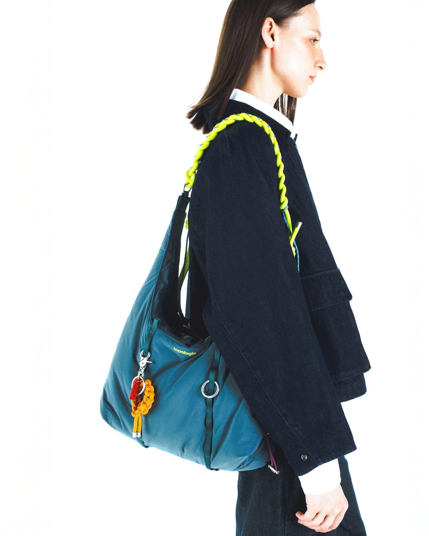 8.0mm Braided O-Rope Ash stylishly carrying a Topologie bag with an adjustable strap.