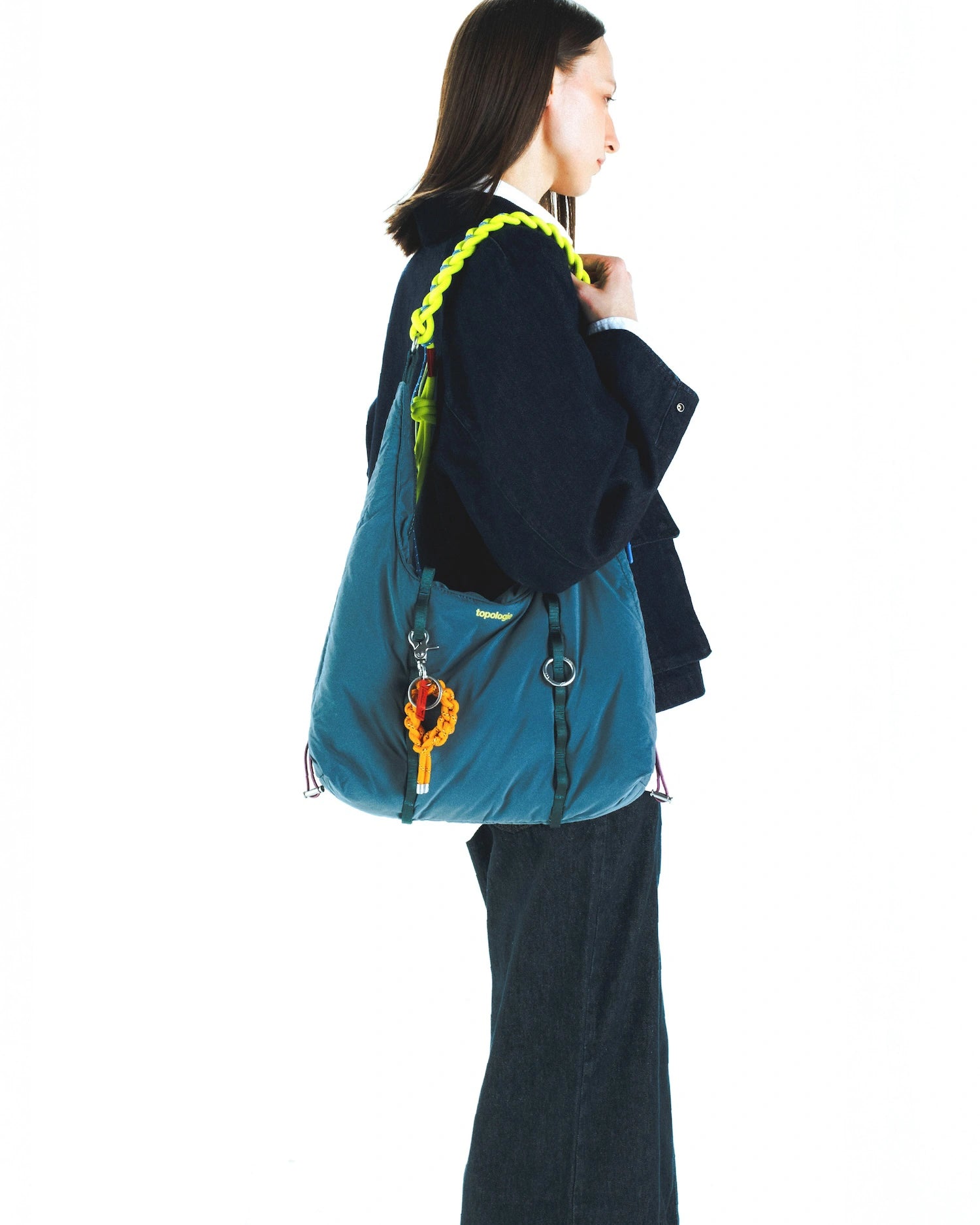 8.0mm Braided O-Rope Ash used with a Topologie bag, showcasing adjustable strap length and versatile carrying options.